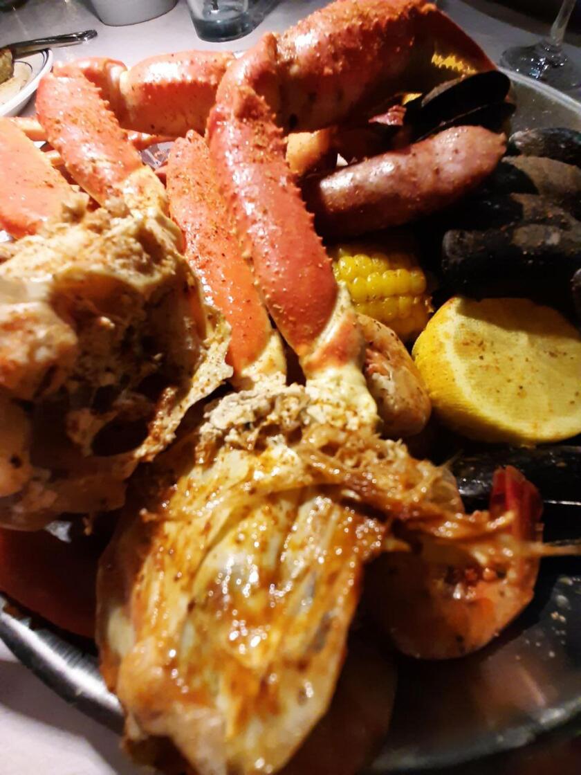 Granchio e pesce cucinati alla griglia, tra i piatti popolari in Alabama - RIPRODUZIONE RISERVATA
